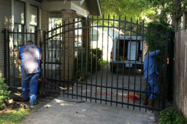 Gate-Rpair 1 two houston gates repair men working